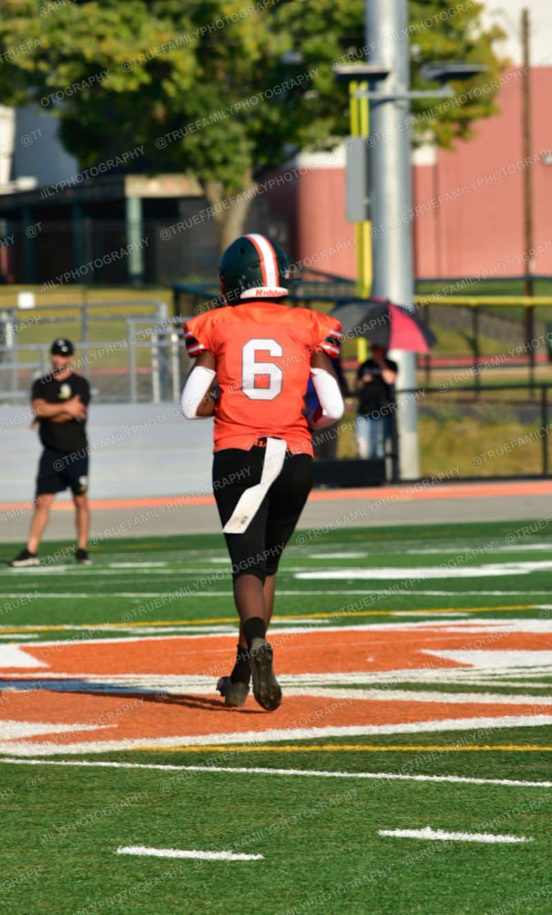 JV #6 Jayden Wilhelm on the orange paint vs Golden Sierra.