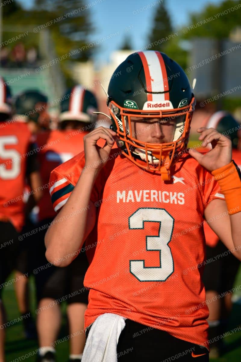 JV #3 Kamden Martens straps the helmet vs Golden Sierra.