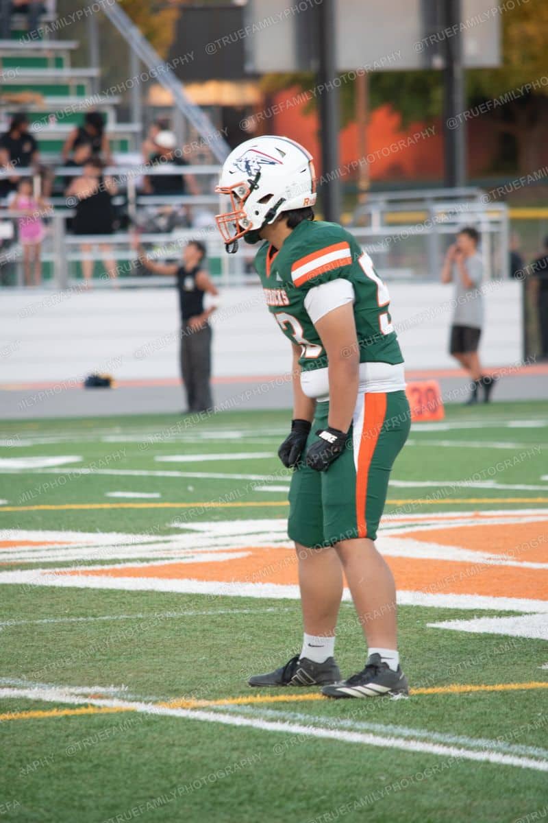 #32 Isaac Green on the orange paint vs Golden Sierra.