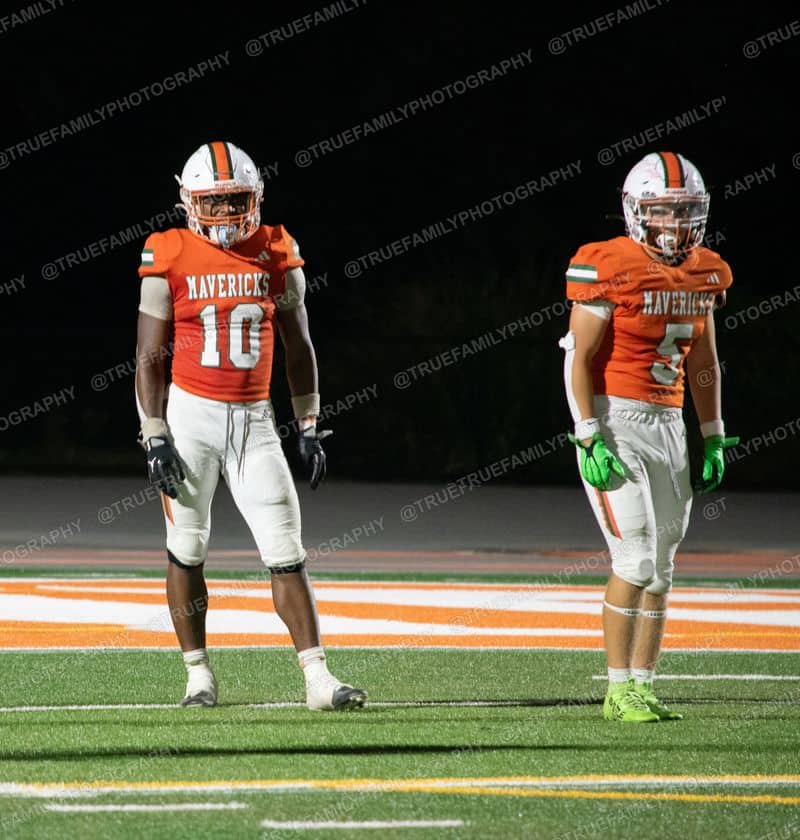 Varsity #10 and #5 on the orange paint vs St. Vincent.